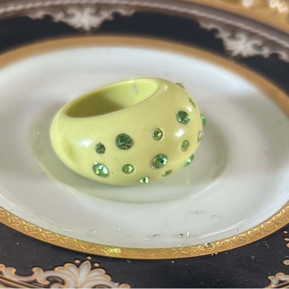 Yellow Ring with Green Gemstones